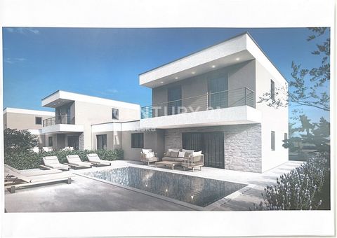 This end-of-terrace house, with a modern design, is currently under construction. It consists of an entrance hall, storage room, kitchen, dining room, living room, and bathroom on the ground floor, while the first floor contains two more rooms and on...