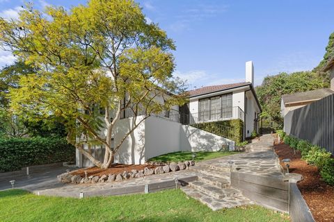 Elevated behind a high-walled garden, this exquisite residence, recently refurbished this year, seamlessly blends the timeless elegance of its c1930s origins with contemporary luxury. Awash in natural light, this beautifully updated brick family home...