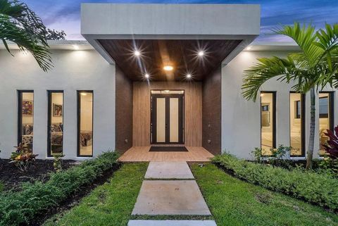 Fort Lauderdale - À vendre - Maison moderne de plain-pied - 4 chambres - Séjour et cuisine équipée - terrain de 4,449 sqft - Garage - Piscine - Proche des commerces, restaurants et écoles. Bienvenue dans cette magnifique et rare nouvelle construction...