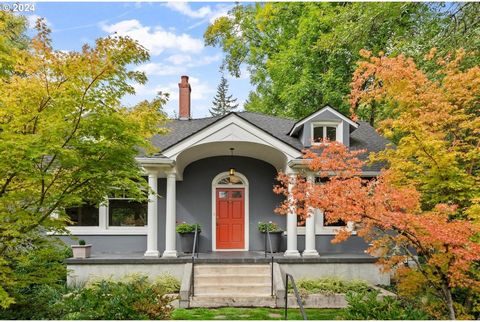 You'll recognize this home by its ready-for-Halloween, pumpkin-orange front door. A hint of fall shows itself too on this professionally designed and well-cared-for landscape. The house was originally part of a holly farm and was moved to its current...