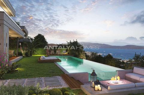 Maisons Uniques avec Vue sur la Mer et Espaces de Vie Modernes Les maisons individuelles modernes de Bodrum Yokuşbaşı offrent des intérieurs spacieux conçus pour le confort et l'élégance. Chaque maison dispose de quatre chambres, de plusieurs salles ...