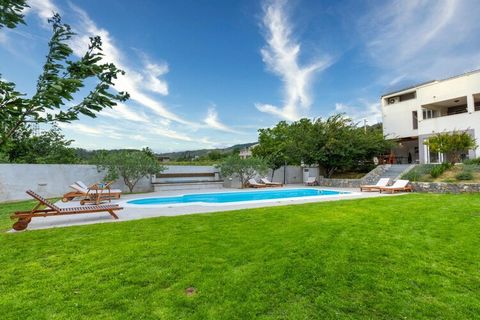 The Serene Rural Villa with Pool, Sun Deck, and Children's Play Area located in Tugare, Split-Dalmatia County, Croatia, offers a tranquil retreat in a picturesque setting. This villa combines the charm of rural life with modern comforts, making it an...