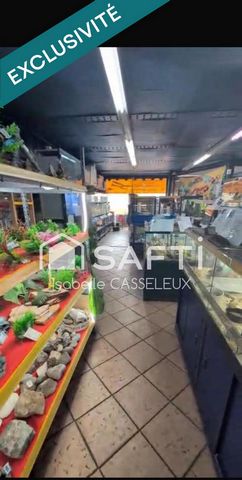 Saint-Quentin - Remicourt : Un immeuble au cachet unique, avec un vaste local commercial en vitrine sur rue passante, idéal pour donner vie à vos projets les plus ambitieux.