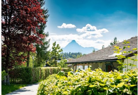 This pet-friendly ground-floor apartment in Füssen offers a cozy retreat for families or small groups. It features two bedrooms, one with a double bed and another with two singles, a bright living/dining room with TV, radio, high chair, and baby crib...