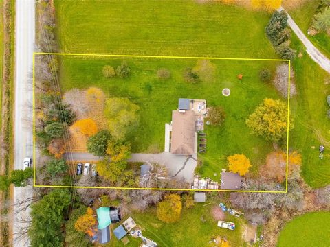 Location, Location, Location! Solid Brick Bungalow Sitting On 1 Private Acres, Close To Georgetown, Milton. This Property & Home Has Been Well Maintained, Clean. 2 + 1 Bedrooms, Open Concept Living/Dining Room Combination Boasts A Floor To Ceiling St...