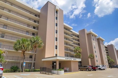PRICE IMPROVEMENT! Special assessments have been paid by the seller! Nestled within the prestigious Sandcastle North Condo Complex in the idyllic community of Ponce Inlet, this exquisite 2-bedroom, 2-bathroom condo is a testament to coastal living at...