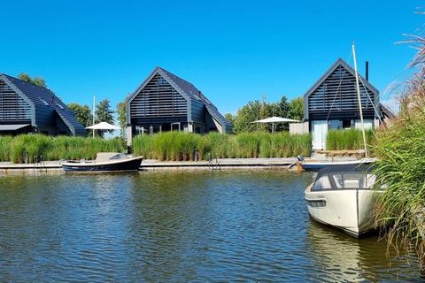 This luxurious detached water villa with its own jetty is very suitable for 4 adults and 2 children. The water villa is located on a new small-scale villa park with a direct connection to the Slotermeer. You can rent a boat at the villa park. The wat...