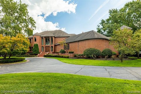 Breathtaking unobstructed views of Lake St. Clair. This exceptional property is situated on almost 2 acres of prime real estate with 203 feet of water frontage with a boat ramp. The masterful custom created home was built by John Uznis in 1992 for th...