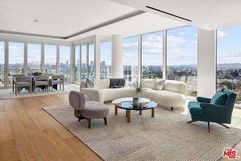 Sub-Penthouse 1102 (aka 11B) of the Four Seasons Private Residences Los Angeles. This nearly 5,000 square foot estate in the sky boasts unparalleled, unobstructed 270 degrees city lights, ocean and landmark views of Los Angeles. recently custom built...