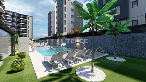 Chique Appartementen in een Complex met Zwembad en Parkeergelegenheid in Antalya Kepez Appartementen te koop zijn gelegen in de wijk Fevzi Çakmak in Antalya. De wijk Kepez wint aan waarde met zijn nieuwe projecten en investeringen. De wijk valt op do...