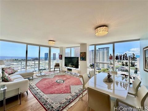 Step into luxury living with this turn-key, pet-friendly 3-bedroom, 2-bathroom sanctuary in Symphony Honolulu! Nestled in the coveted 09 stack, this residence offers an invitingly spacious living room flooded with natural light and Full ocean views t...