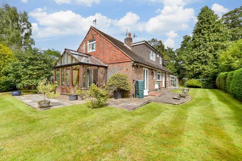 Nestling within the historical curtilage of the beautifully restored St Raphaels, is this charming mid-20th century detached property. It is situated in 0.44 of an acre of wraparound lawns surrounded by impressive specimen trees, shrubs and high hedg...