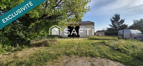 Hangar 185 m² avec terrasse sur terrain clos