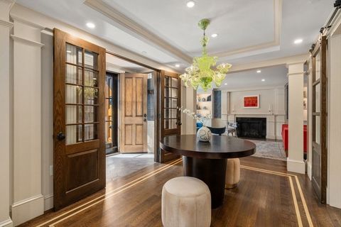 Offering one of the finest custom renovations, this expansive 2++ bedroom (2 bedrooms plus 2 additional bonus rooms), 3 bath condo with private patio at the desirable Tudor on Beacon Hill's South Slope is not to be missed. Situated directly across fr...