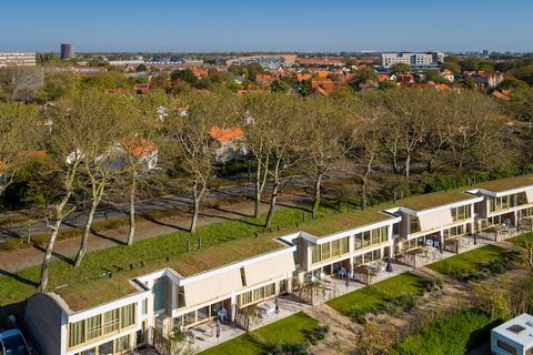 Modern Comfort by the Sea This stylish 5-person holiday home at North Sea Resort Vlissingen offers a bright, modern retreat just steps from the dunes. Floor-to-ceiling windows bring in natural light, creating a spacious, airy feel. Enjoy cozy evening...
