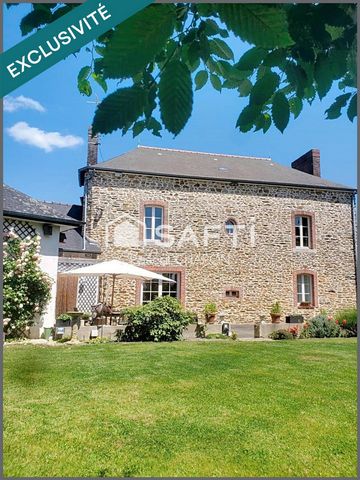 Superbe maison en pierre : centre bourg, vaste terrain, dépendances.