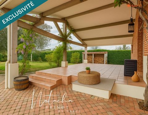 À Villaudric, maison de caractère avec jardin de 3000 m² et double garage