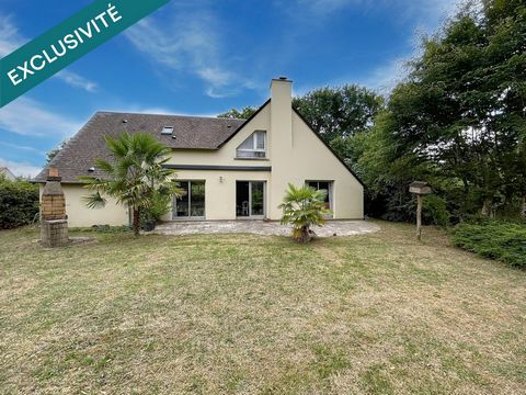 Maison familiale avec garage et jardin