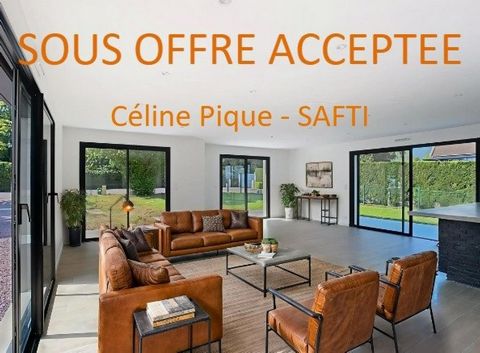 Maison récente de plain-pied avec beau jardin et garage dans bel environnement