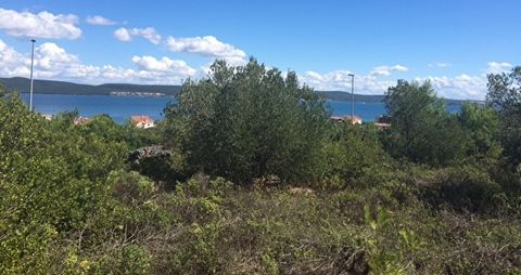 In place Dobropoljana on island Pašman for sale is urbanized land area of 2400 m2. It is located in a nice location with a magnificent view of the sea and sorrounding places of Biograd.The terrain has a width of approximately 54 m, and length of appr...