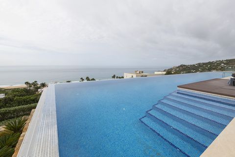This modern villa with sea views and private pool welcomes up to 6+2 guests. The exteriors of this property are designed to give you the rest you deserve. At the entrance you will find a huge chlorine swimming pool with stunning sea views, with dimen...