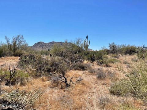 Pristine, gorgeous 9.95 acres 1 block from Scottsdale Preserve - with VIEWS and abundant natural high desert vegetation. One of the most sought after areas to build! NO FLOOD PLAIN, easy build, gently rolling terrain. Horse privileges and classy upsc...