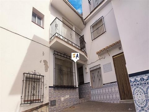 This furnished 4 bedroom, 2 bathroom townhouse with a 112m2 build size is situated in the centre of Alcaucín, in the Malaga province of Andalucia, Spain. The property consists of 3 floors. The ground floor is accessed via a porch into a lounge off wh...