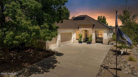 This beautifully updated Stoneridge home perfectly combines modern amenities with private charm. Situated on a spacious, meticulously landscaped lot, this move-in ready residence boasts a primary bedroom suite complete with a walk-in closet, direct a...