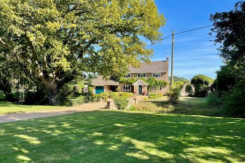 OAK HOUSE Oak House is a stunning five bedroom detached family home nestled in the heart of the Suffolk countryside. The property is named after the impressive oak tree that stands proudly in the front garden. It is accessed by a long driveway that c...