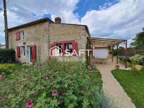 Maison avec pierres et poutres apparentes