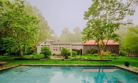 Set on over 6 acres of wooded privacy, this home is a truly unique property that blends timeless historic charm with thoughtful modern updates. Originally built in the 1700s in Hamden, this antique home was meticulously relocated to Woodbridge in 198...