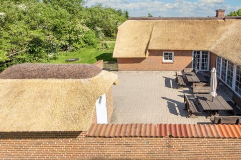 A well-kept holiday home with a pool, located in a peaceful area close to a national park. Approx. 1600 metres to the sea. In the pool section you can relax in the whirlpool or sauna. There is a counter-current system in the pool and slide for childr...