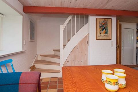 This charming holiday cottage with thatched roof is located in scenic surroundings within walking distance to the Wadden Sea at Ballum. The house has a bedroom with double bed, bathroom and open-concept kitchen with dining area on ground floor. There...
