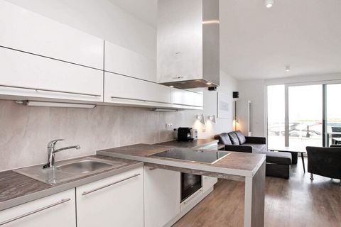 Modern and comfortable holiday apartment on the ground floor directly next to the harbor promenade and with a view of the Baltic Sea and the marina. Marina Wendtorf. The apartment has a kitchen / living room with a sofa bed and access to the terrace,...