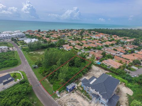 Discover the epitome of luxury living on this remarkable 11,075 sq.ft. vacant lot nestled within the prestigious gated enclave of Palm Cay. Ideally situated in a prime location, this beautiful parcel offers the rare opportunity to craft your dream ho...