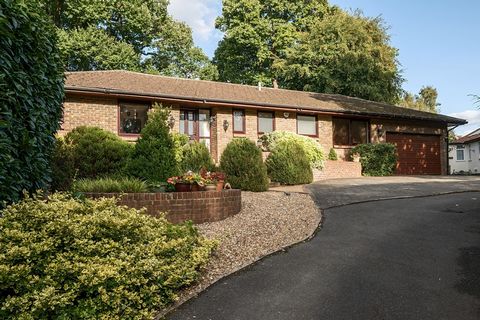 This fabulous bungalow is situated within a short distance of Kingswood and Tadworth village, both provide a comprehensive parade of local shops and restaurants. Locally there is a wide choice of state and independent schools. There is a footpath lea...