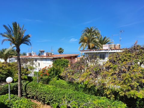Townhouse for sale in the center of Arguineguín, Gran Canaria The house: Its distribution is as follows: The living room has large windows and a sliding glass door that brings in plenty of natural light and opens onto a terrace. The kitchen has an op...
