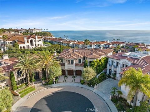 Experience unparalleled luxury in this ocean view home located in prestigious Ritz Cove. Every corner of this residence exudes elegance, with outstanding architectural details and meticulous trim work throughout. From intricately designed ceilings an...