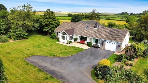 This fantastic six-bedroom detached chalet bungalow is located in the highly desirable village of Lovacott, being conveniently located within easy access of Barnstaple, Bideford and Torrington. The property offers the perfect blend of stylish and mod...
