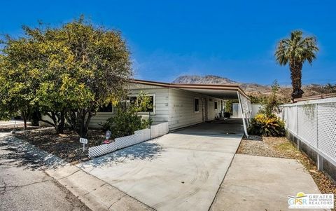 2bed/2bath 1440 sq ft home nestled on an oversized lot with breathtaking mountain view in the back (no neighboring home to look at!!). This backyard affords peace and quiet enjoyment. The home is located in one of the premier 55+ guard gated mobile h...