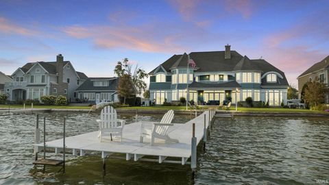 OPEN HOUSE - Sunday - 9/15/24 - From 1:00pm - 3:00pm Welcome to this luxury residence set on Kale Island, Pier 702, nestled amidst the shimmering waters of Lake Wawasee, Syracuse, IN. Offering an impressive six Bedrooms, all with views of the water i...