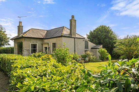 Une maison d’accueil du 18ème siècle, classée Grade II, qui faisait partie d’un domaine d’importance historique du Lincolnshire, nichée en privé à la lisière d’un magnifique parc, forme un monde idyllique à part entière, tout en étant à proximité des...