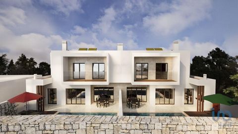 Terreno com projeto aprovado para construção de duas moradias V4 geminadas com piscina e garagem. Cada casa é composta por 3 pisos. O piso 0 comtempla a zona da cave - garagem, o piso 1 conta com uma sala do tipo “open space” e o espaço exterior tem ...