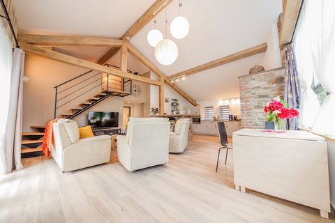 This charming holiday home in Oster, Manhay offers a peaceful escape in the heart of the Ardennes. Ideal for couples or small families, the property is just 6 km from Manhay and within easy reach of popular attractions like Adventure Valley Durbuy, t...
