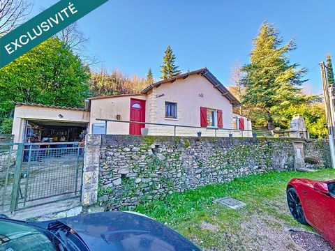 Maison plain pied avec garage et beau terrain