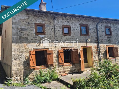 Maison en pierres de village avec terrasse..