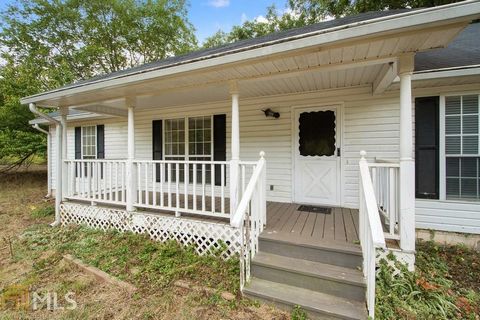Located in Monroe. Builders Welcome, this 4 bedroom, 3 bathroom house sits on 33.24 acres!!! Home includes large great room with hardwood flooring and cozy fireplace. Spacious bedrooms with walk in closets. House includes pole barn and a pond. Previo...