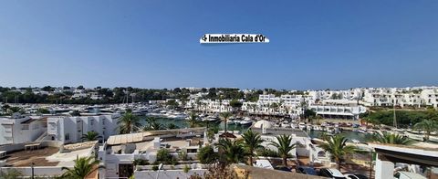 Stunning penthouse apartment with the best and most unique position on the harbor of Cala d'Or with excelent views out to sea over the harbour and to the mountains Comprising of: Living-dining room with open fitted kitchen, shower and two large terra...