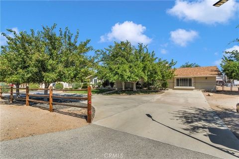 Welcome to this 4-bed, 2-bath home in Hesperia, California, boasting 1,820 sq ft of living space on a generous 1.08-acre lot. The open-concept design connects a spacious living area, dining space, and a modern kitchen. With four bedrooms and a versat...