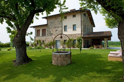 In Peschiera del Garda, among the unique landscapes of the morainic hills, surrounded by the Lugana vineyards, we offer a wonderful villa. A well-kept garden of 3000 m2 surrounds the house, and a further 3000 m2 are used as an orchard and vineyard wh...